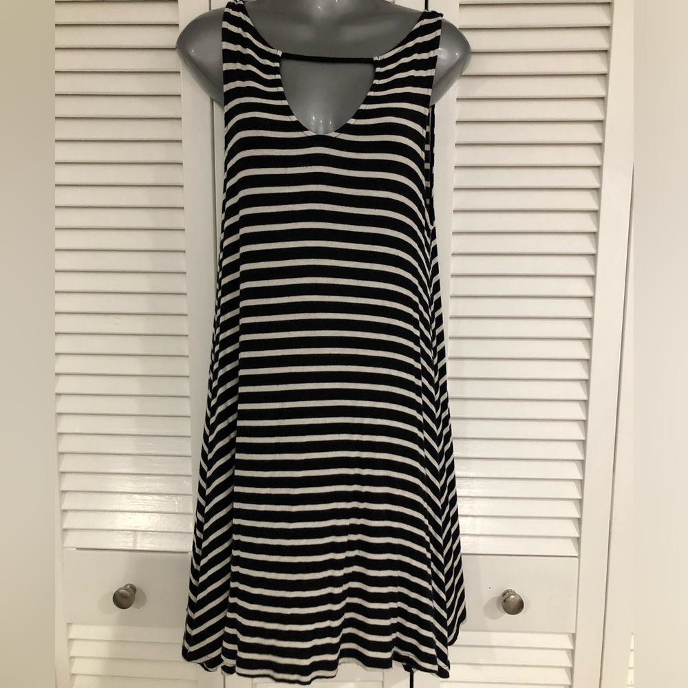 Alya from Francesca’s collections black and white striped sleeveless mini dress